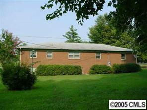 511 Shue Road China Grove, NC 28023 - Photo 2 of 8 a front view of a house with a yard