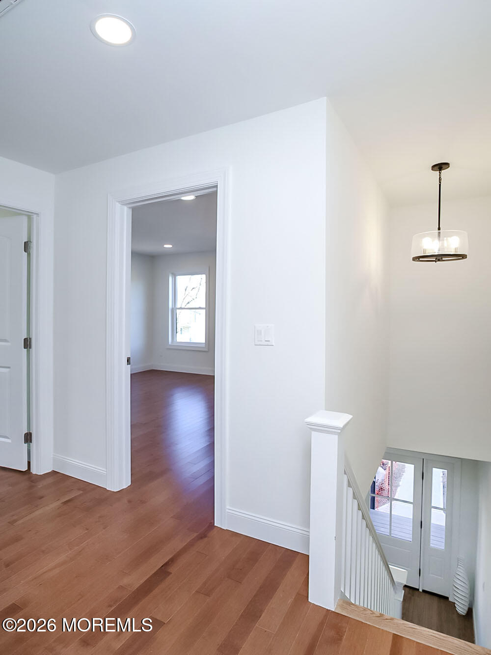 22 Marion Street Red Bank, NJ 07701 - Photo 30 of 50 a view of a hallway with wooden floor and closet