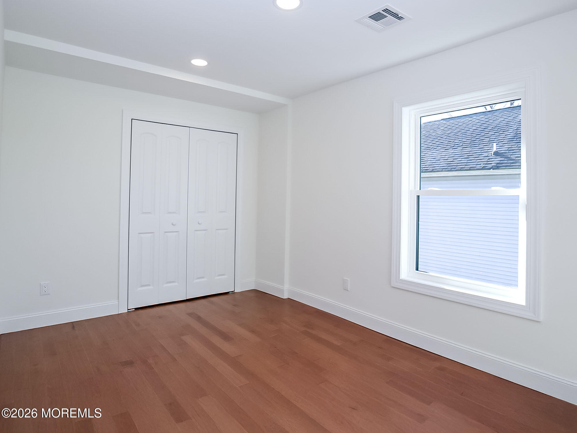 22 Marion Street Red Bank, NJ 07701 - Photo 36 of 50 an empty room with a window