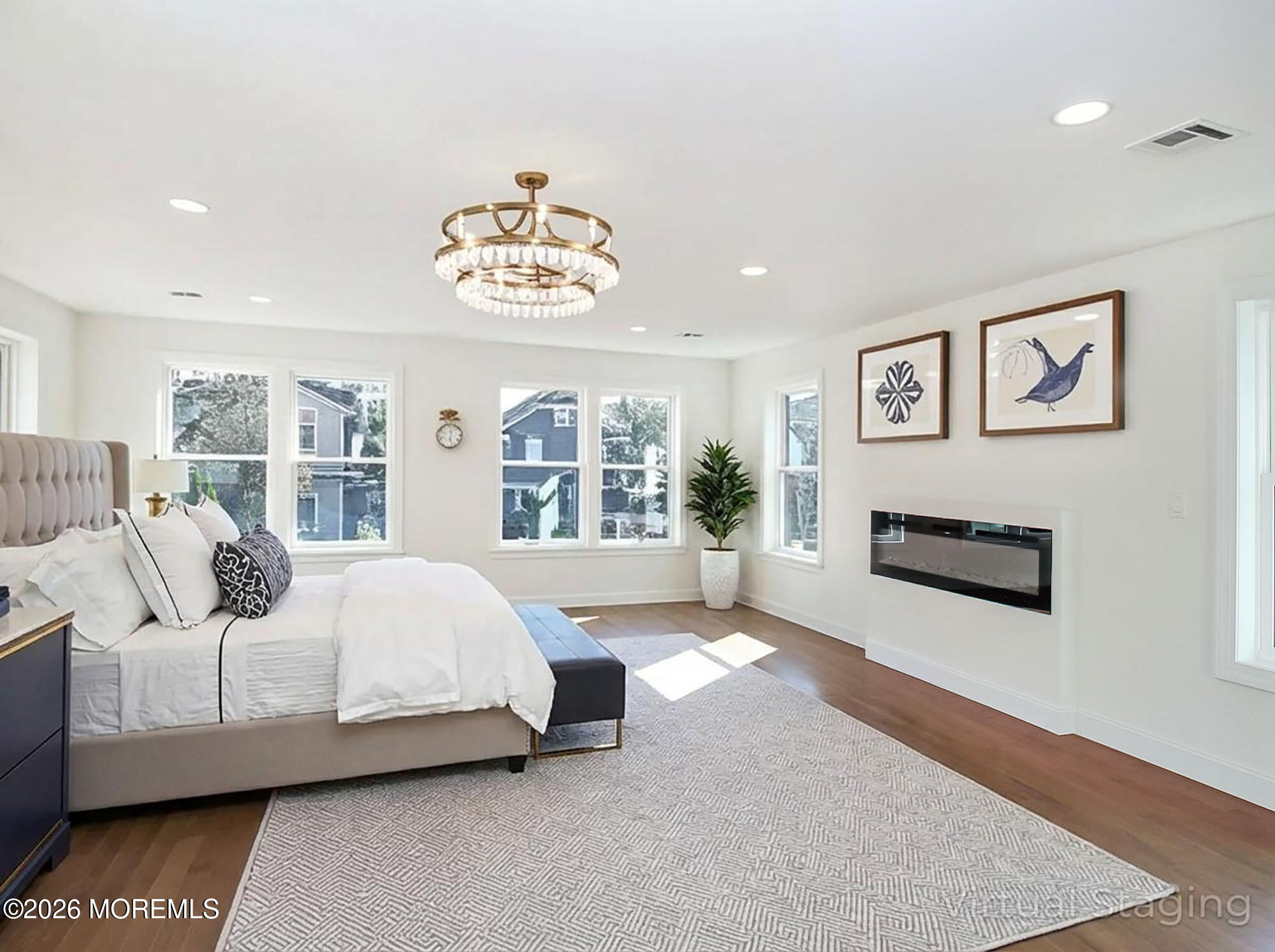 22 Marion Street Red Bank, NJ 07701 - Photo 39 of 50 a spacious bedroom with a bed and a large window