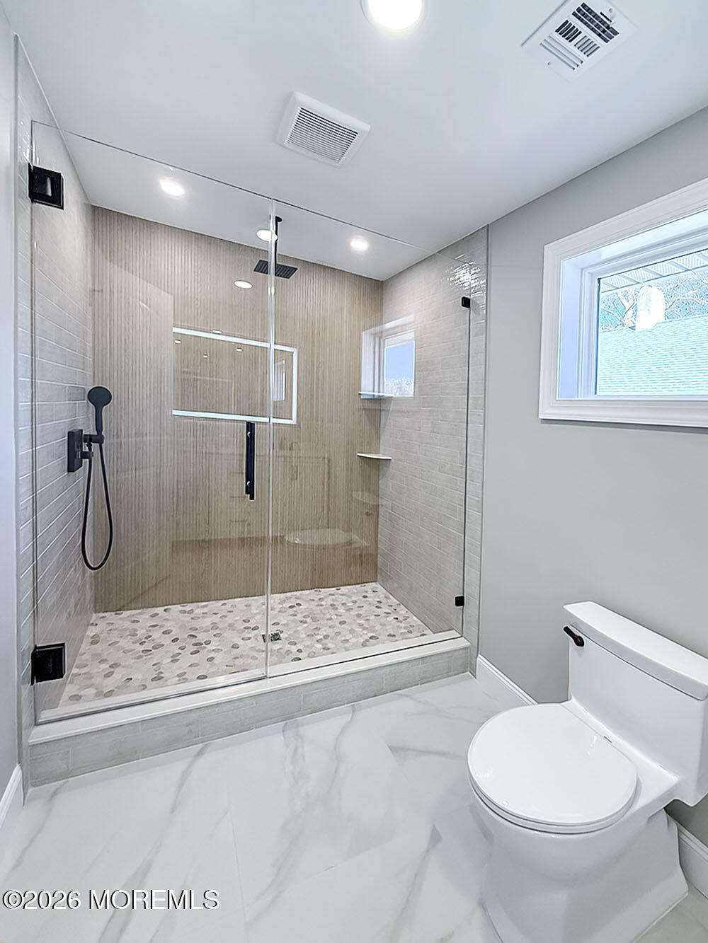 22 Marion Street Red Bank, NJ 07701 - Photo 43 of 50 a bathroom with a sink toilet and shower