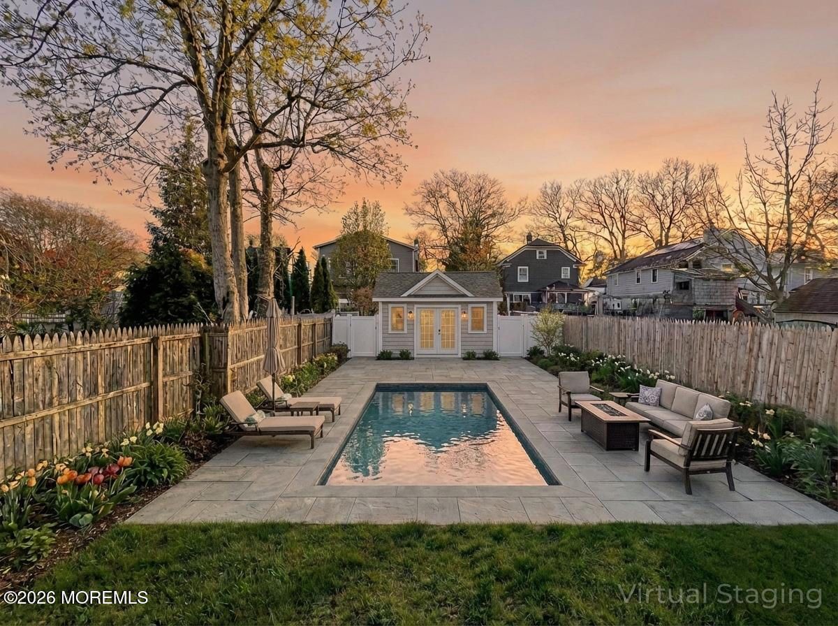 22 Marion Street Red Bank, NJ 07701 - Photo 48 of 50 a view of a house with backyard and sitting area