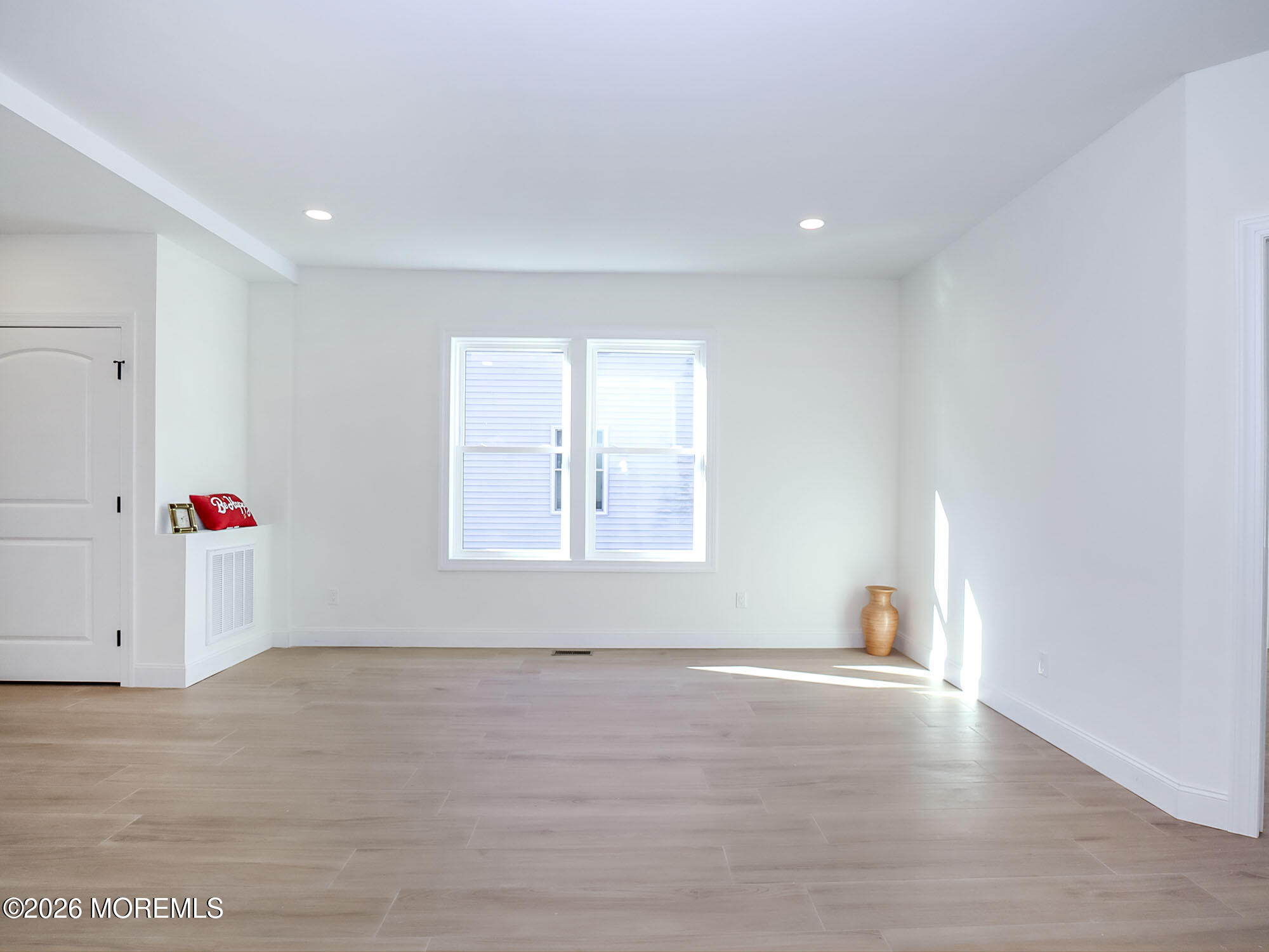 22 Marion Street Red Bank, NJ 07701 - Photo 9 of 50 a view of livingroom with hardwood and hallway