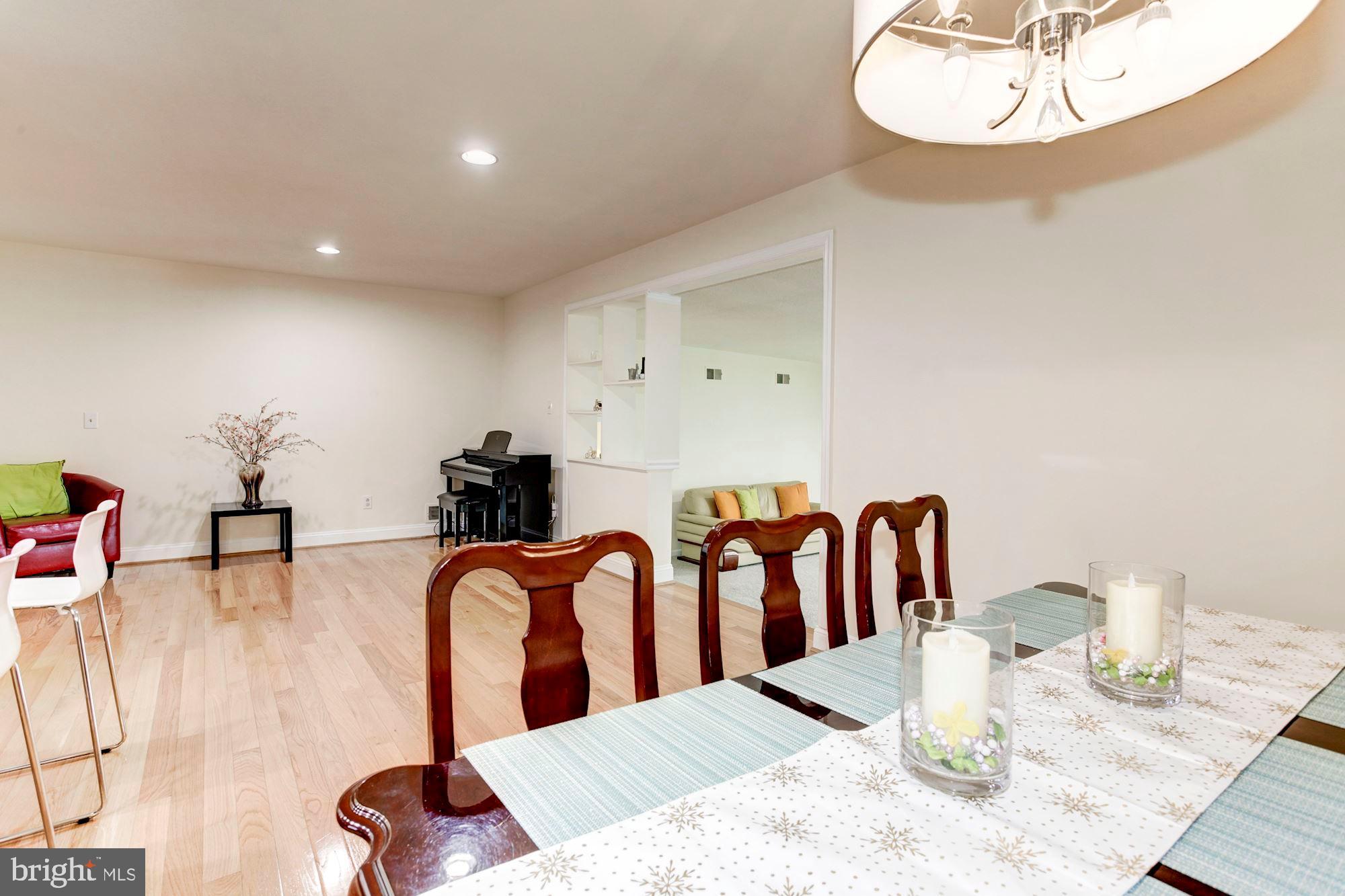 6906 Inverness Drive Springfield, VA 22150 - Photo 11 of 42 DINING ROOM AND LIVING ROOM