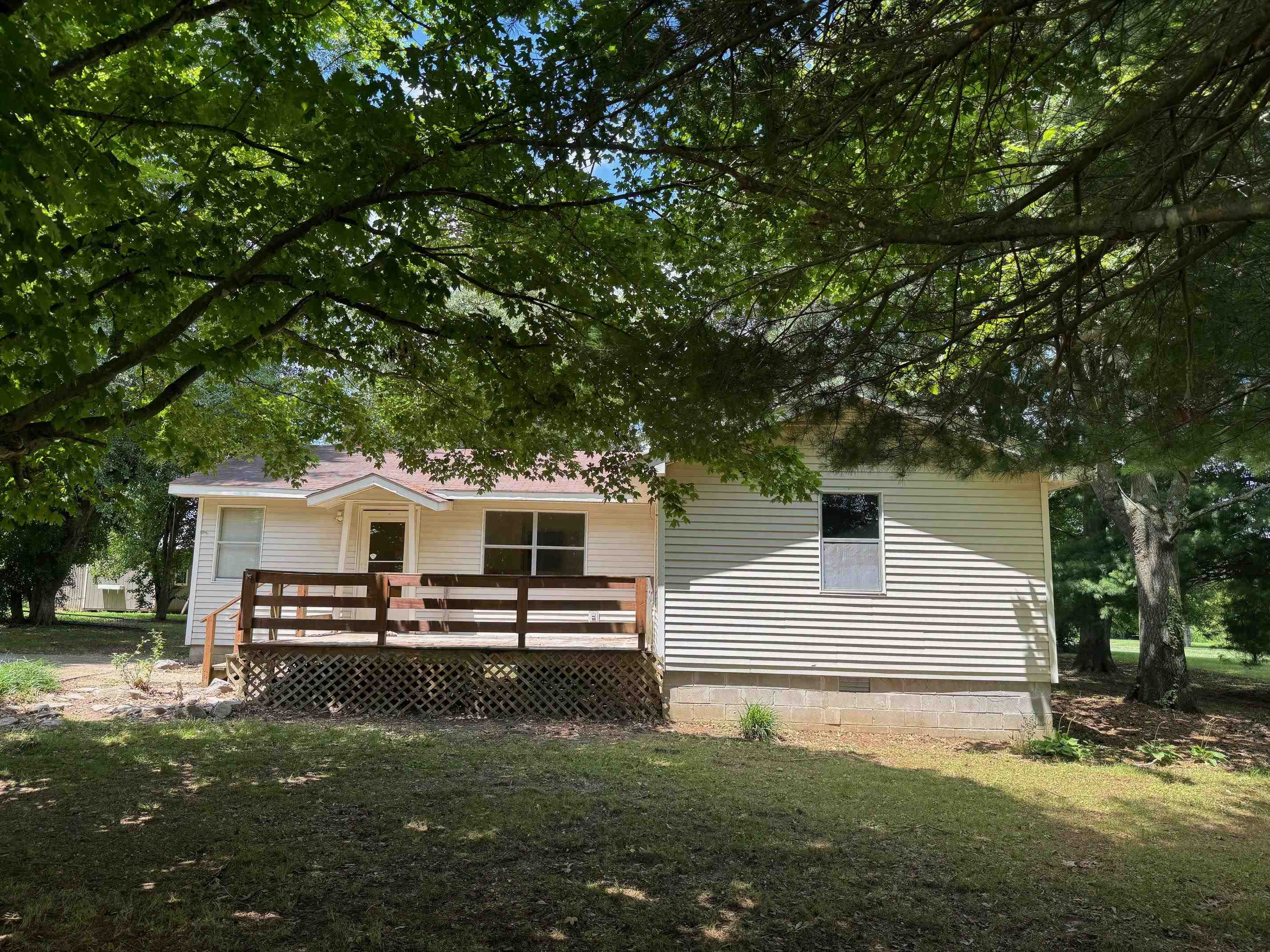 323 Easley Road Newbern, TN 38059 - Photo 13 of 13 a front view of a house with a yard
