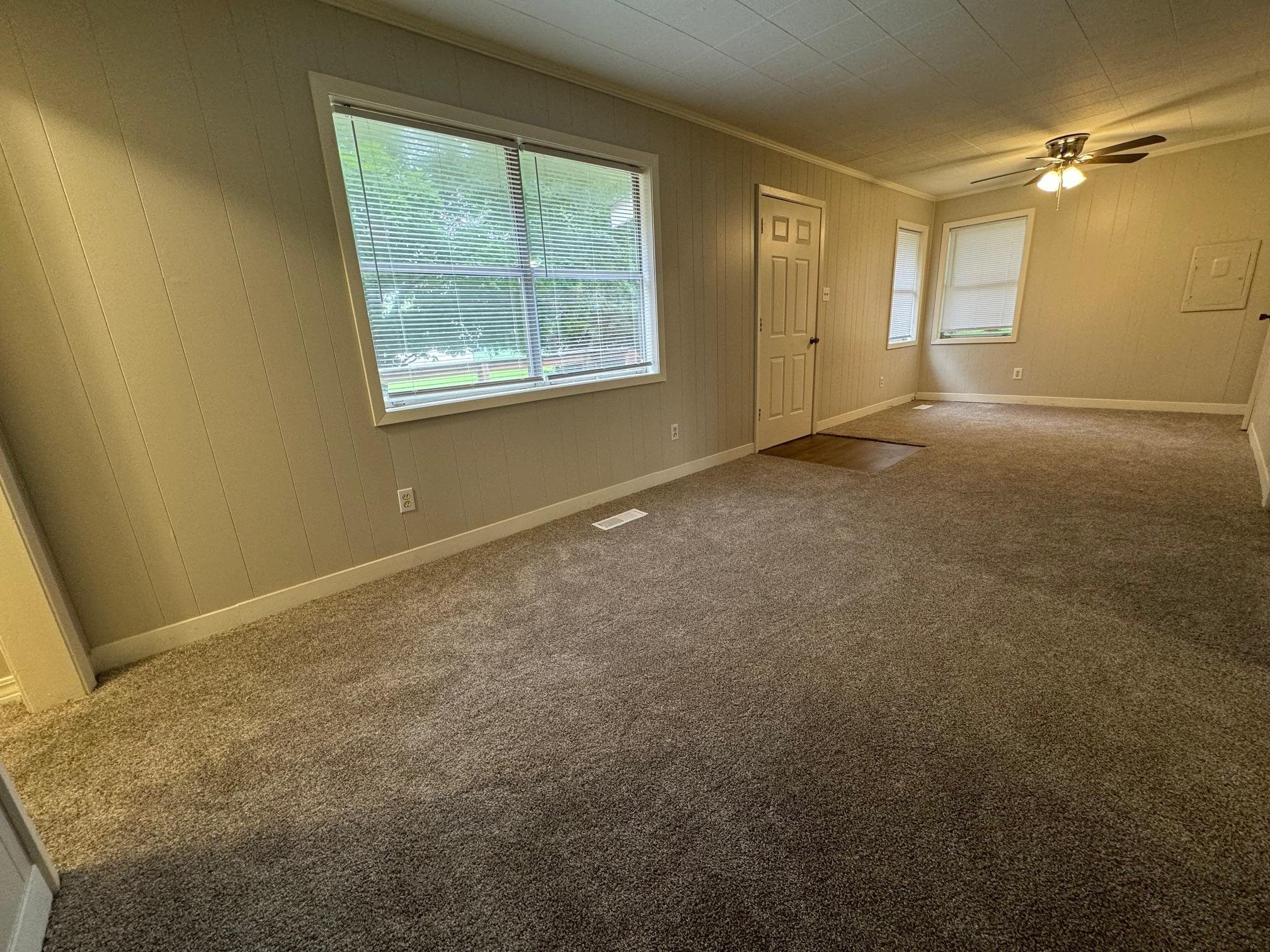 323 Easley Road Newbern, TN 38059 - Photo 2 of 13 a view of an empty room with a window