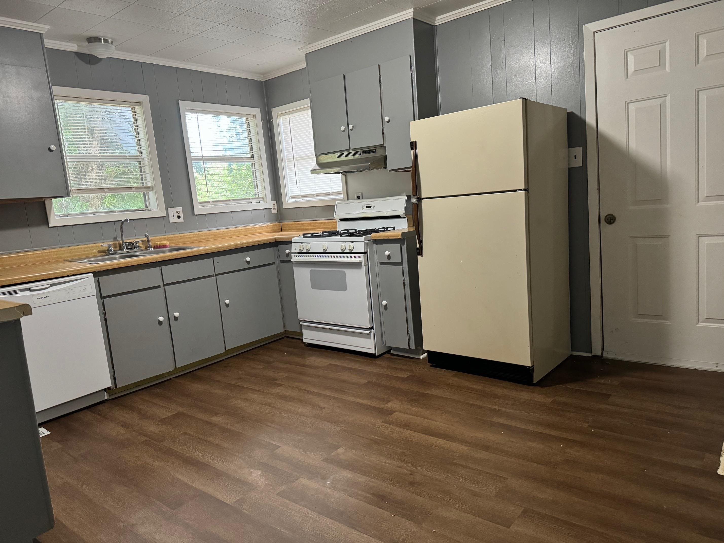 323 Easley Road Newbern, TN 38059 - Photo 3 of 13 a white refrigerator freezer sitting in a kitchen