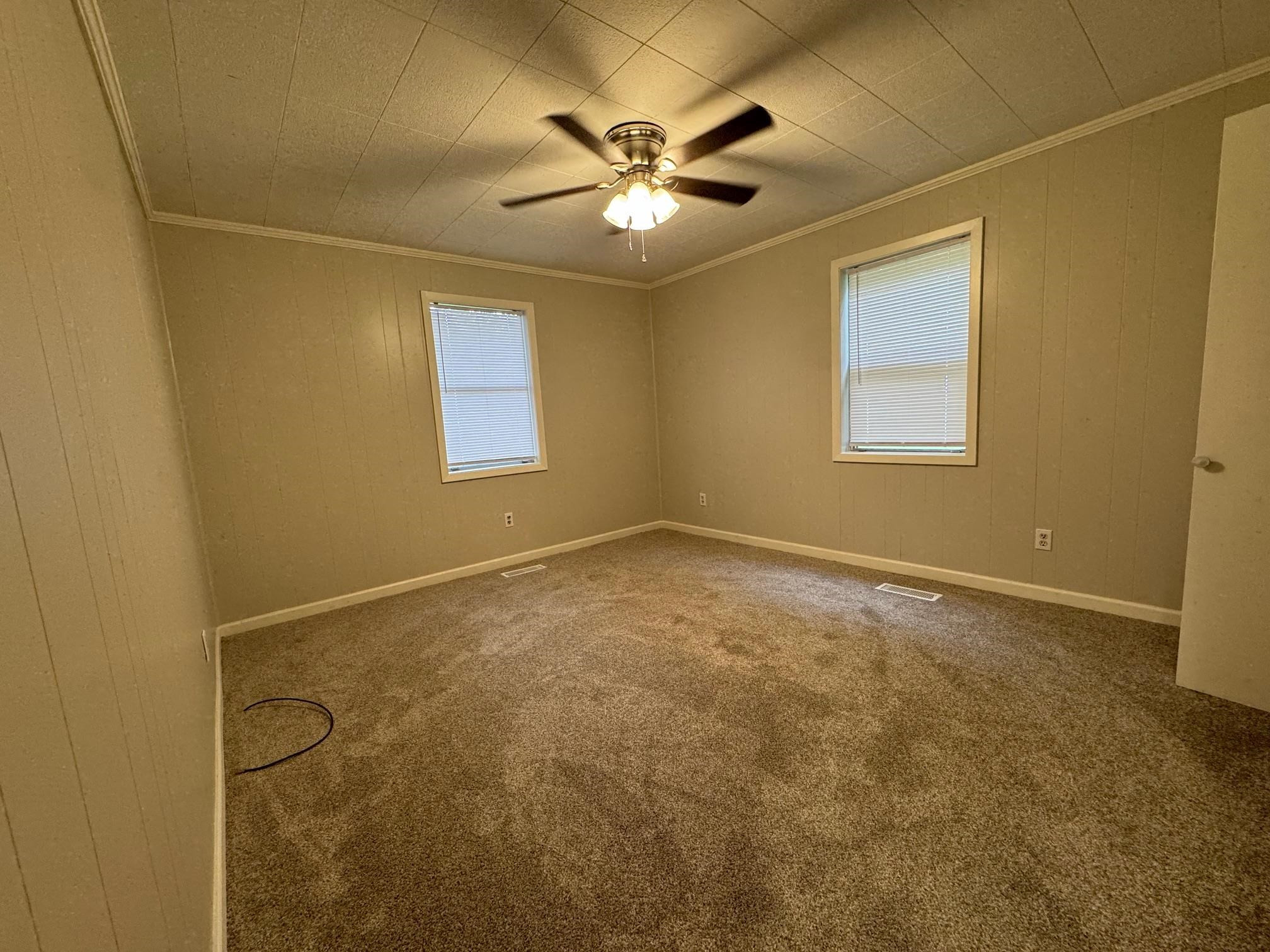 323 Easley Road Newbern, TN 38059 - Photo 6 of 13 a view of an empty room with a window