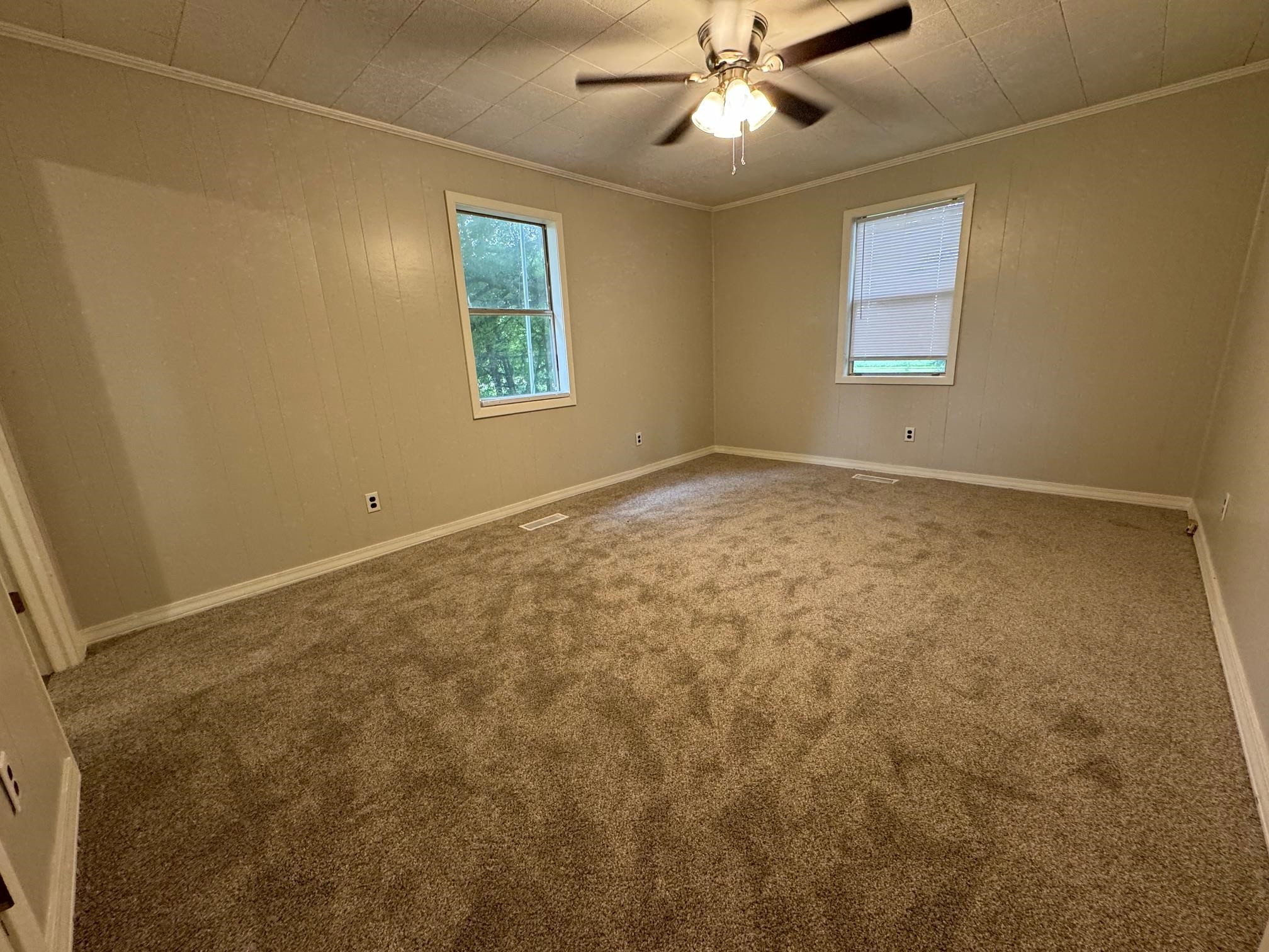 323 Easley Road Newbern, TN 38059 - Photo 8 of 13 an empty room with a window