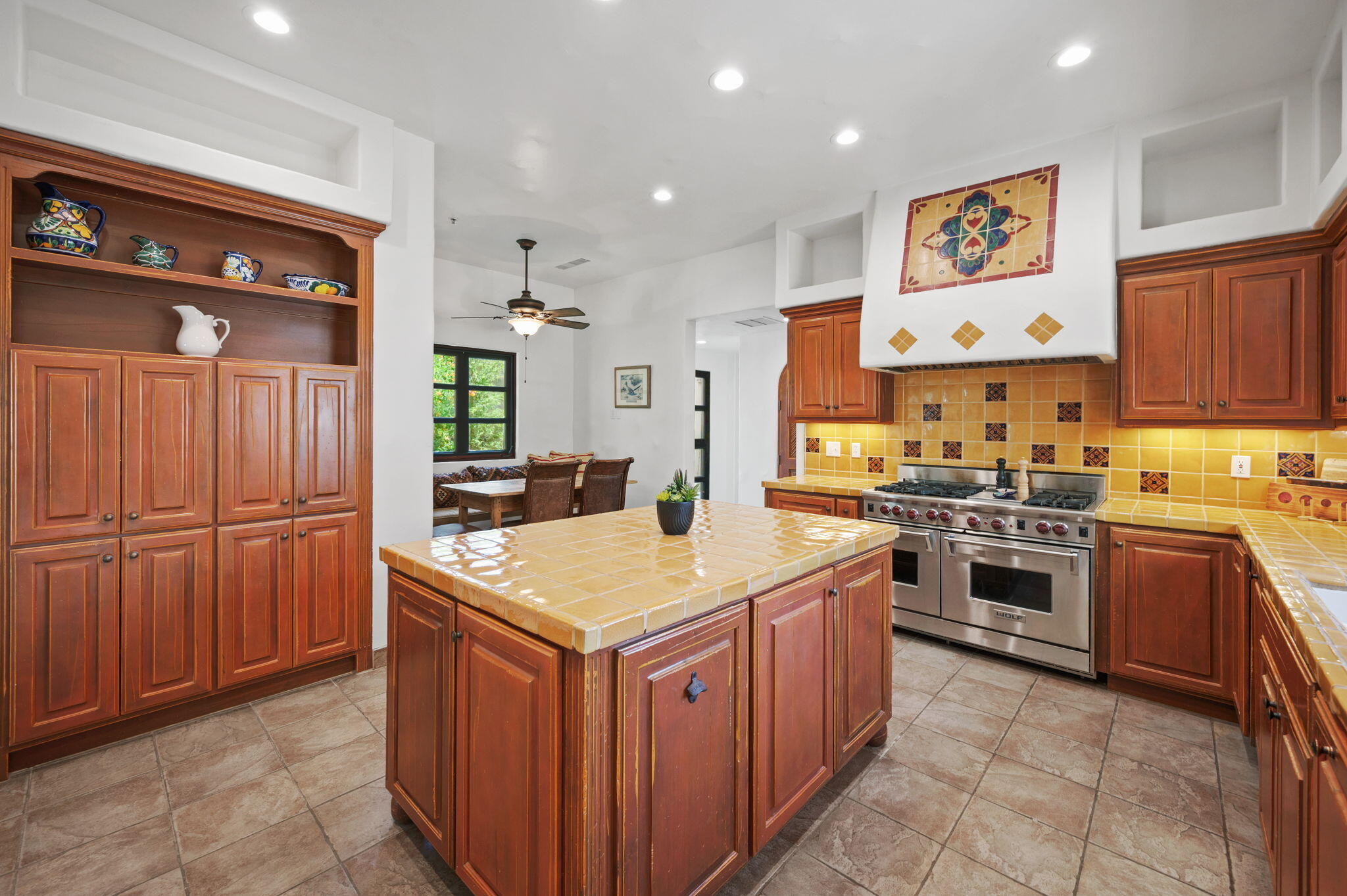 72275 Upper Way West Palm Desert, CA 92260 - Photo 20 of 68 a kitchen with stainless steel appliances granite countertop a stove a sink dishwasher and a refrigerator