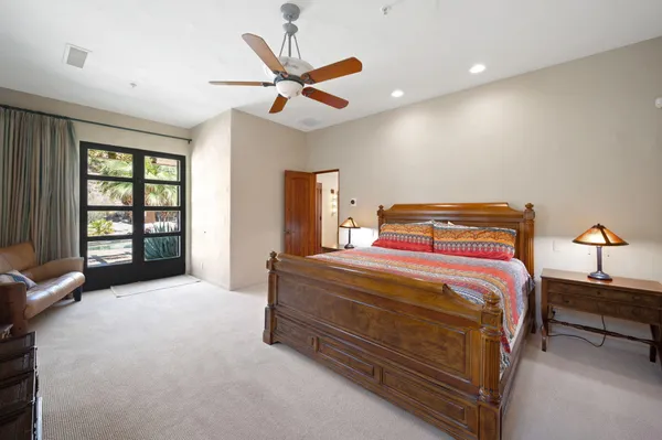 a living room with furniture rug and window
