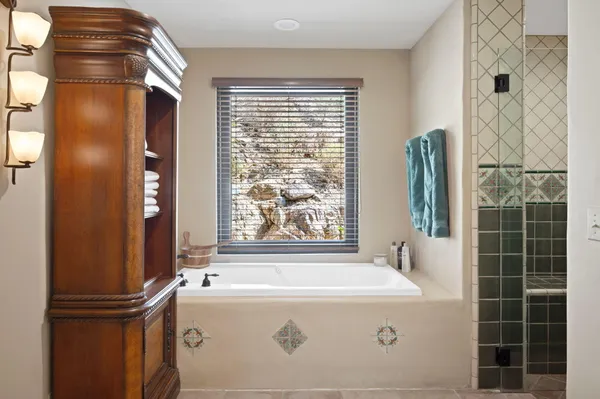 a view of a swimming pool with a yard