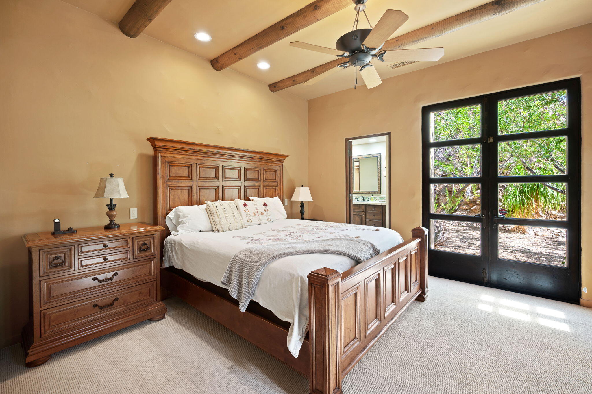 72275 Upper Way West Palm Desert, CA 92260 - Photo 34 of 68 a bed sitting in a bedroom next to a window