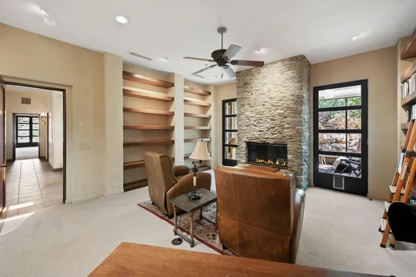 a bathroom with a toilet sink shower and mirror