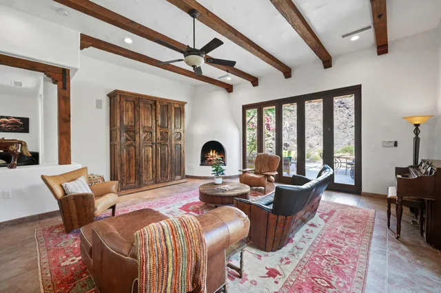 a dining room with furniture and window