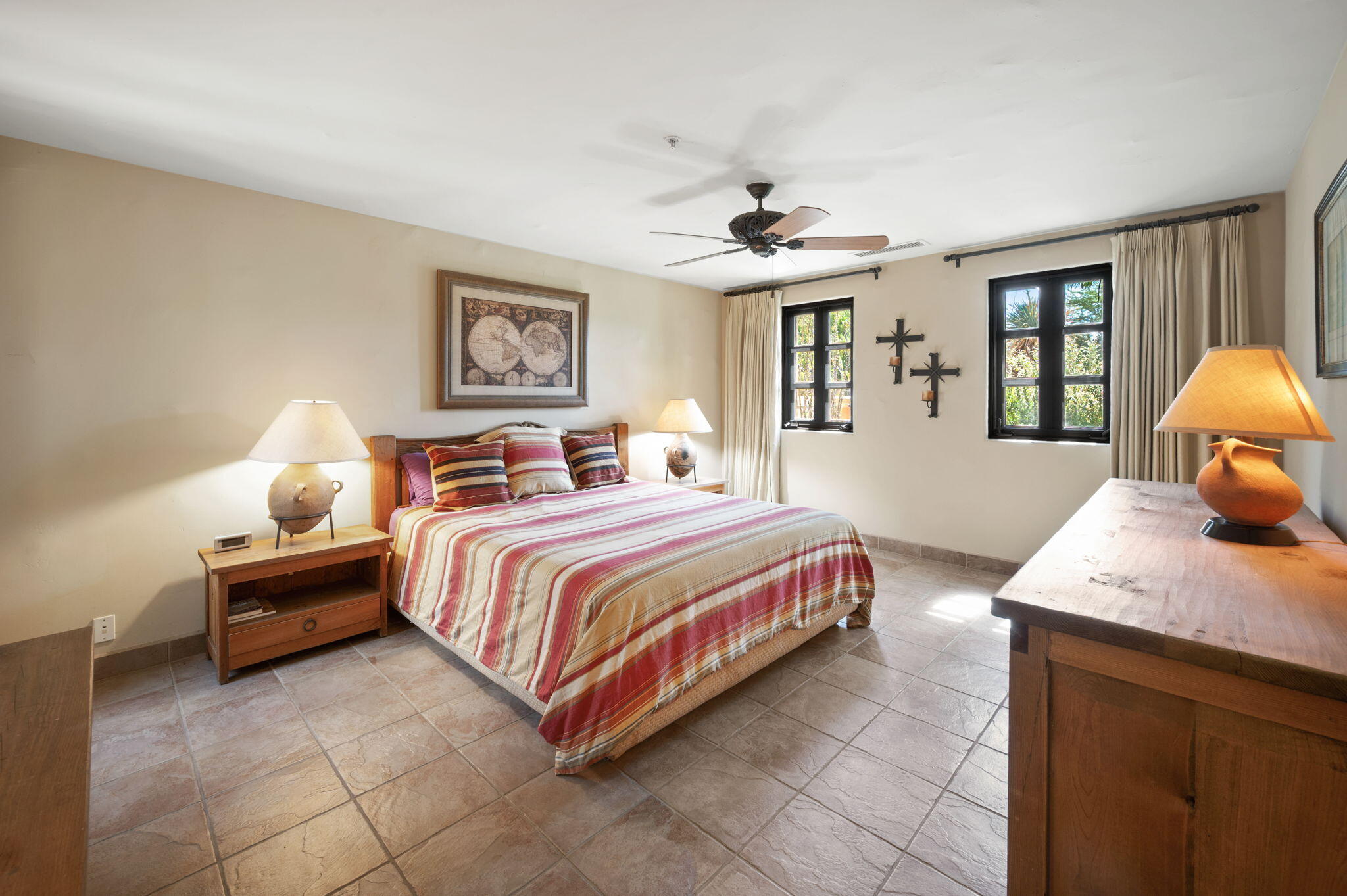 72275 Upper Way West Palm Desert, CA 92260 - Photo 55 of 68 a spacious bedroom with a bed a window and dresser
