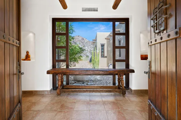 a view of a dining room with furniture window and outside view