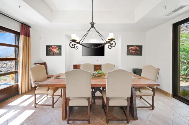 a bedroom with a bed dresser and a window