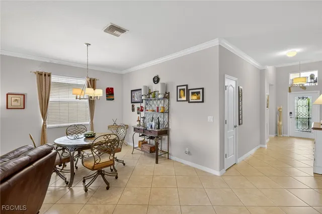 a view of a livingroom with furniture and a window