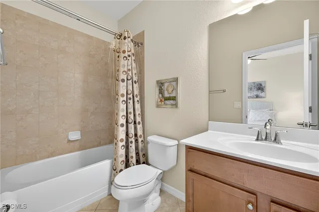 a bathroom with a sink a toilet and a bathtub