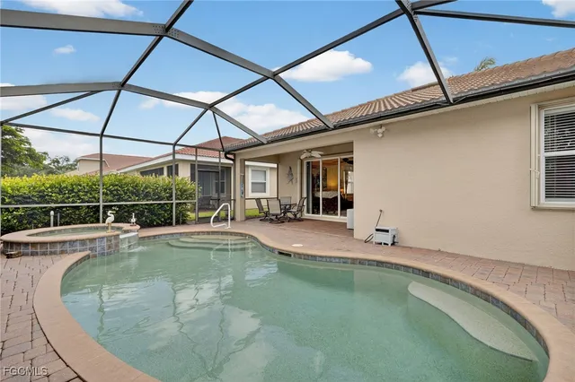 a view of a house with swimming pool