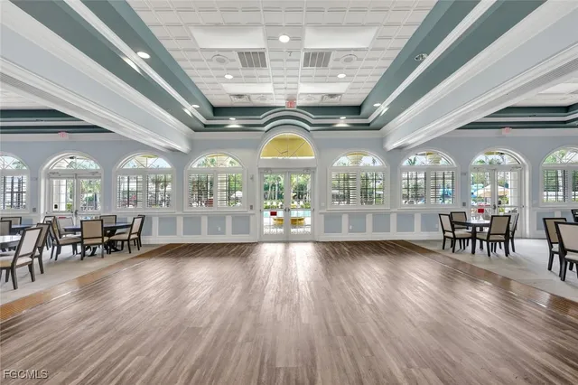 a view of a room with furniture window and wooden floor