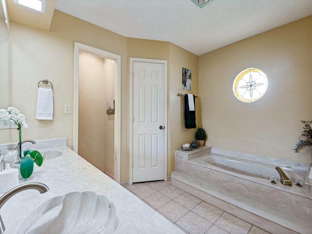 2213 Ridgewood Bedford, TX 76021 - Photo 23 of 40 Another view of the primary bathroom.