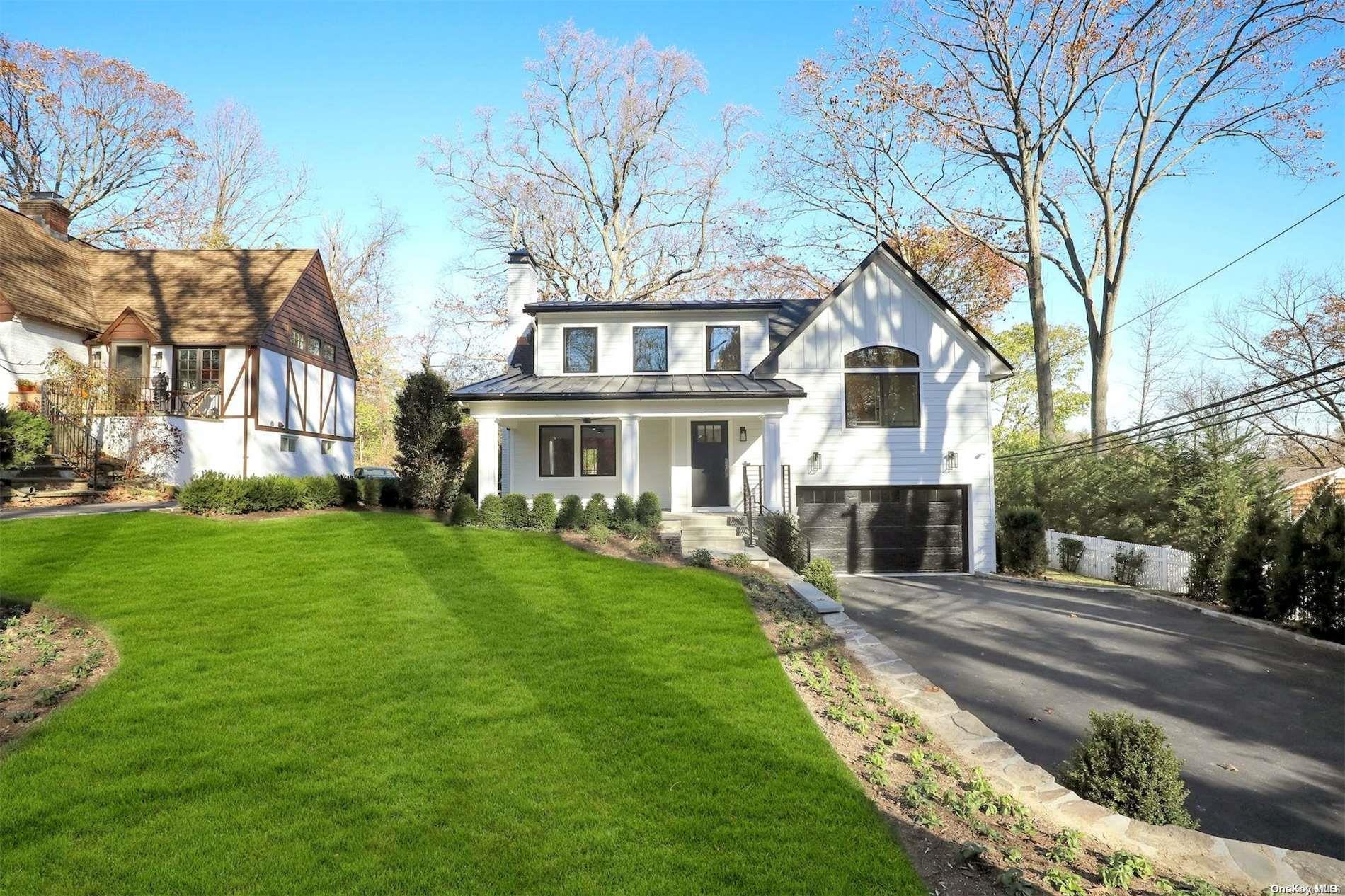 95 Longview Road Port Washington, NY 11050 - Photo 1 of 1 a front view of a house with a yard