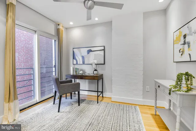 a bathroom with a shower sink and mirror