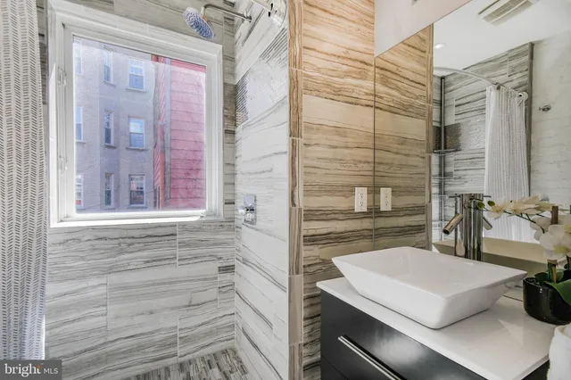 a view of work space with wooden floor and furniture