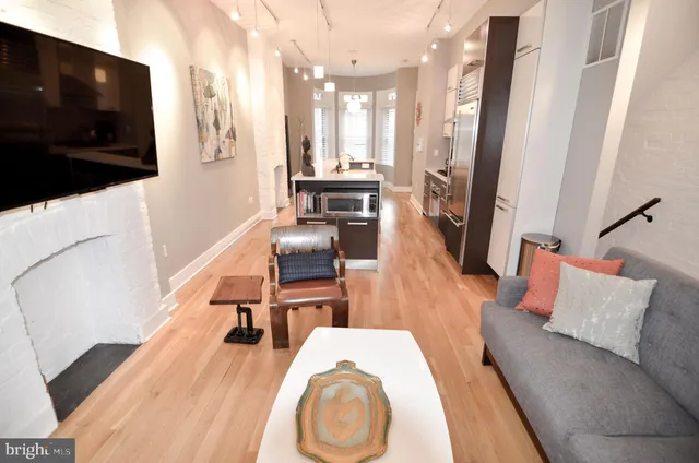 a view of a kitchen from the hallway