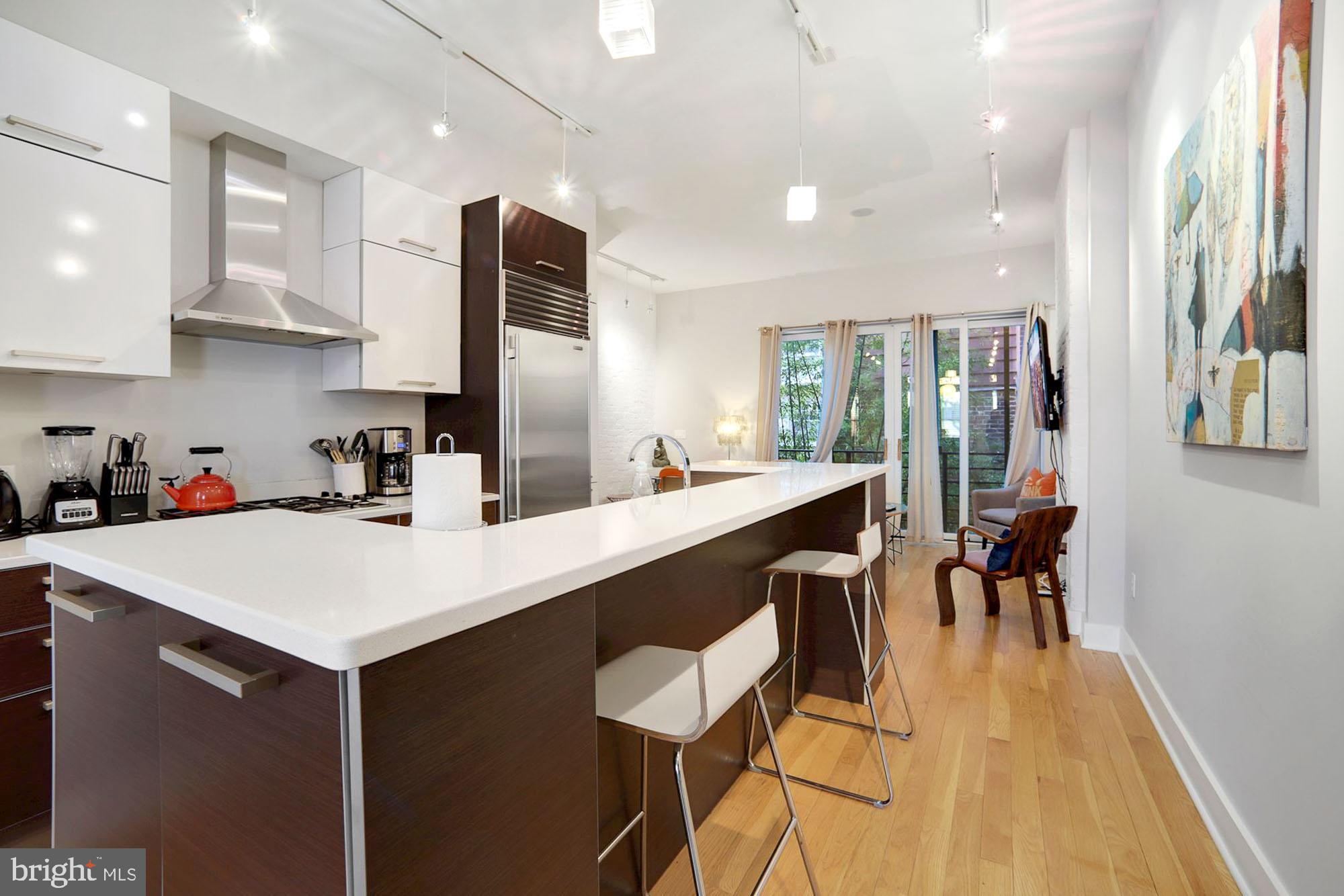1538 Swann Street Northwest Washington, DC 20009 - Photo 18 of 37 Unit 1 - Modern Kitchen with Breakfast Bar