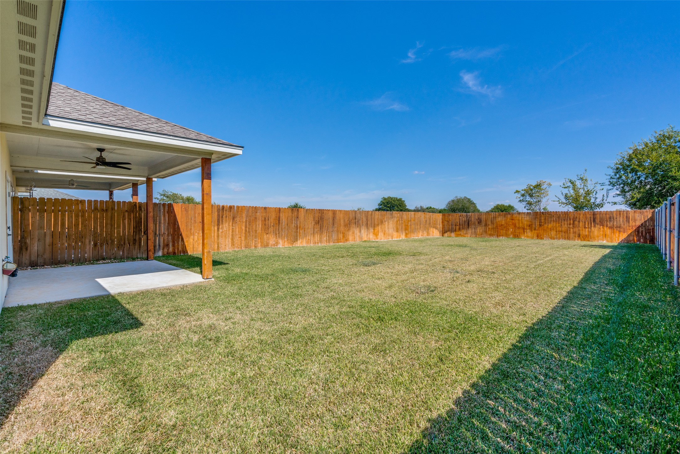 301 Navarro Way, Unit 29B Seguin, TX 78155 - Photo 21 of 26 a view of a backyard