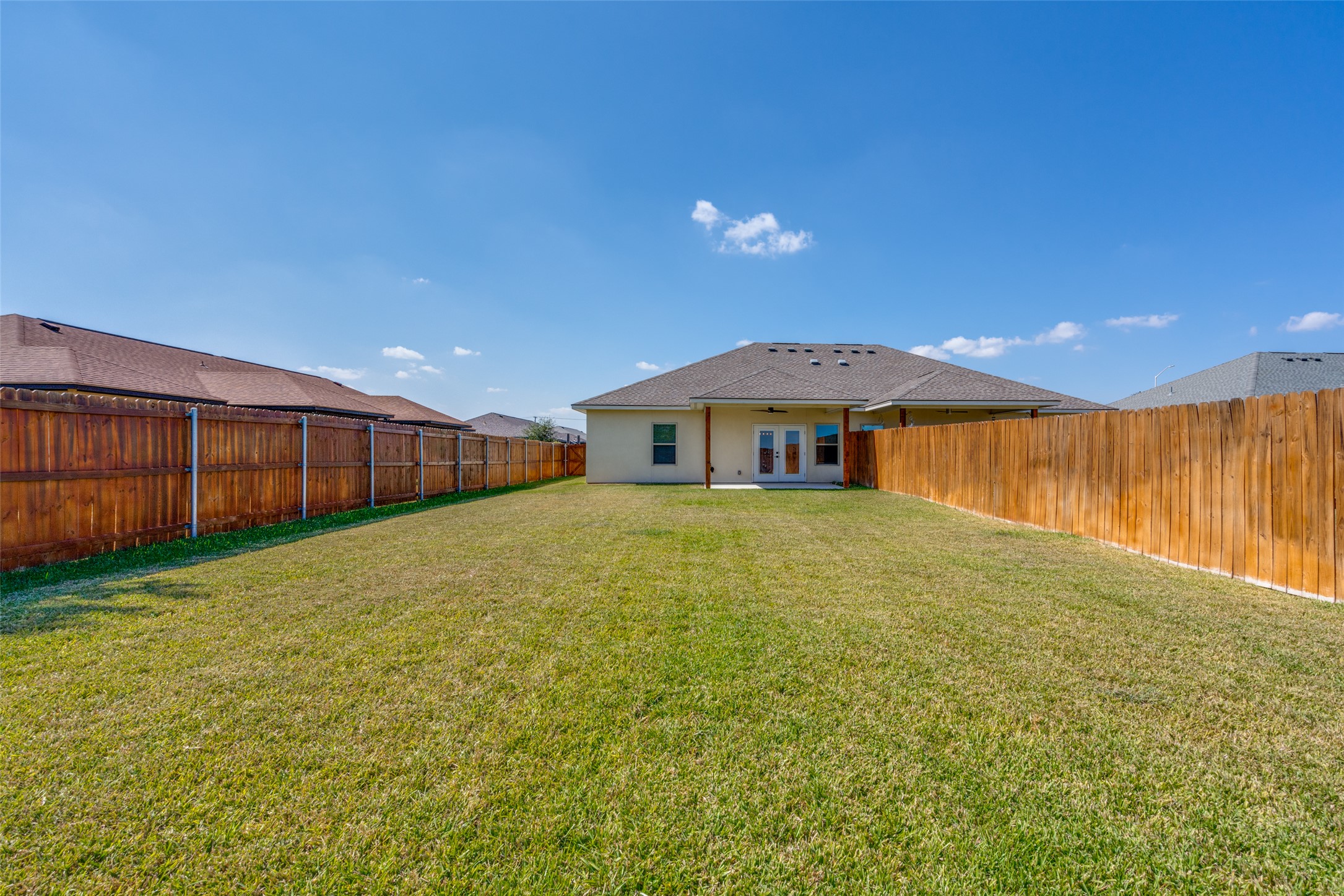 301 Navarro Way, Unit 29B Seguin, TX 78155 - Photo 22 of 26 a front view of a house with a yard