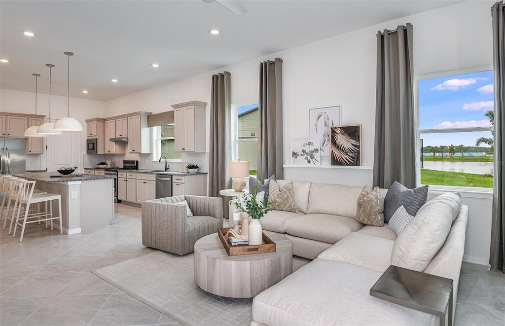 1947 Spring Shower Circle Kissimmee, FL 34744 - Photo 11 of 18 a living room with furniture and a large window