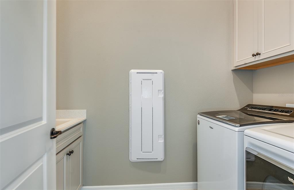 1947 Spring Shower Circle Kissimmee, FL 34744 - Photo 18 of 18 a utility room with dryer and washer