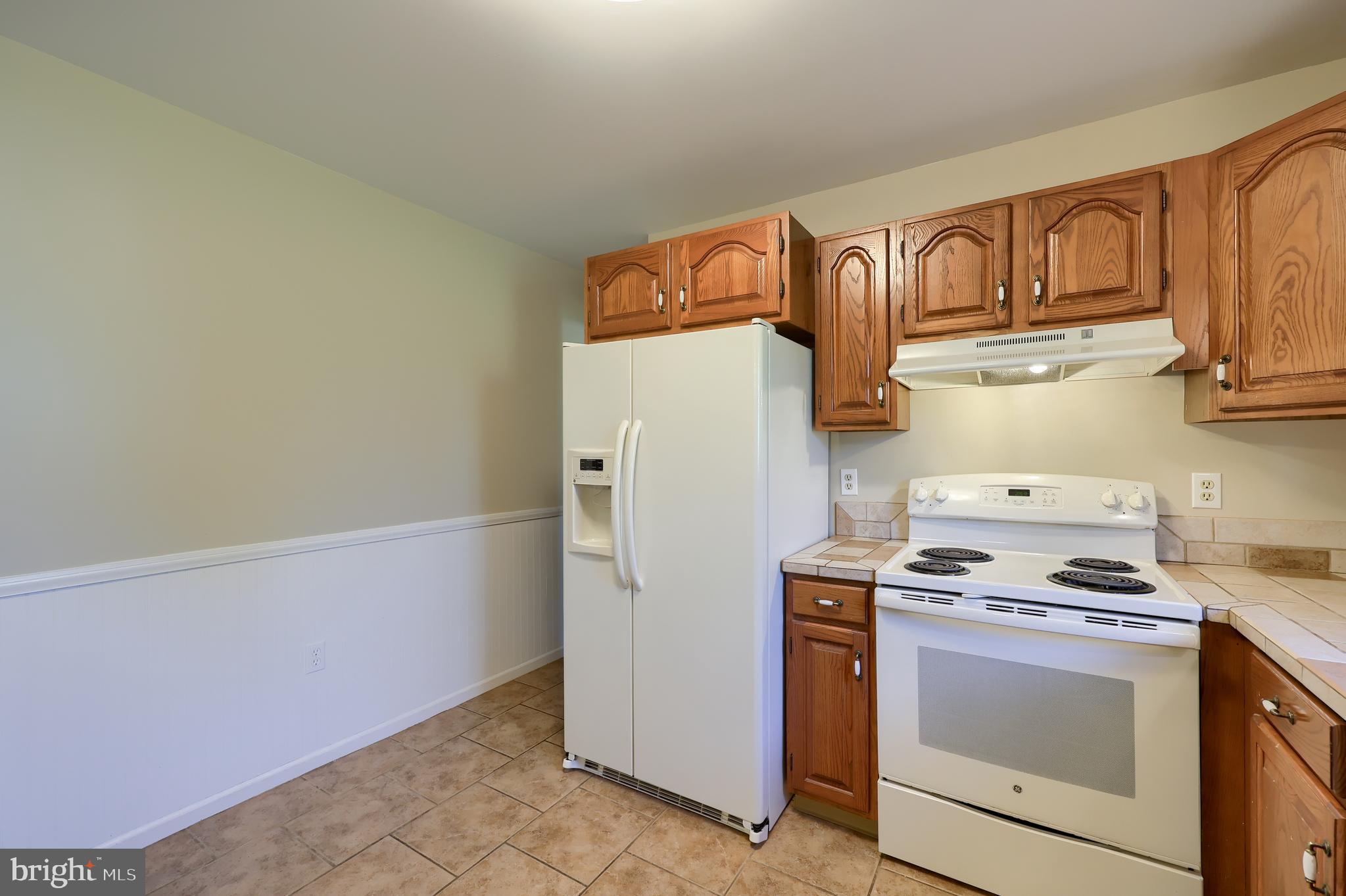 746 West 6th Street Lititz, PA 17543 - Photo 11 of 43 a kitchen with stainless steel appliances a refrigerator stove and cabinets