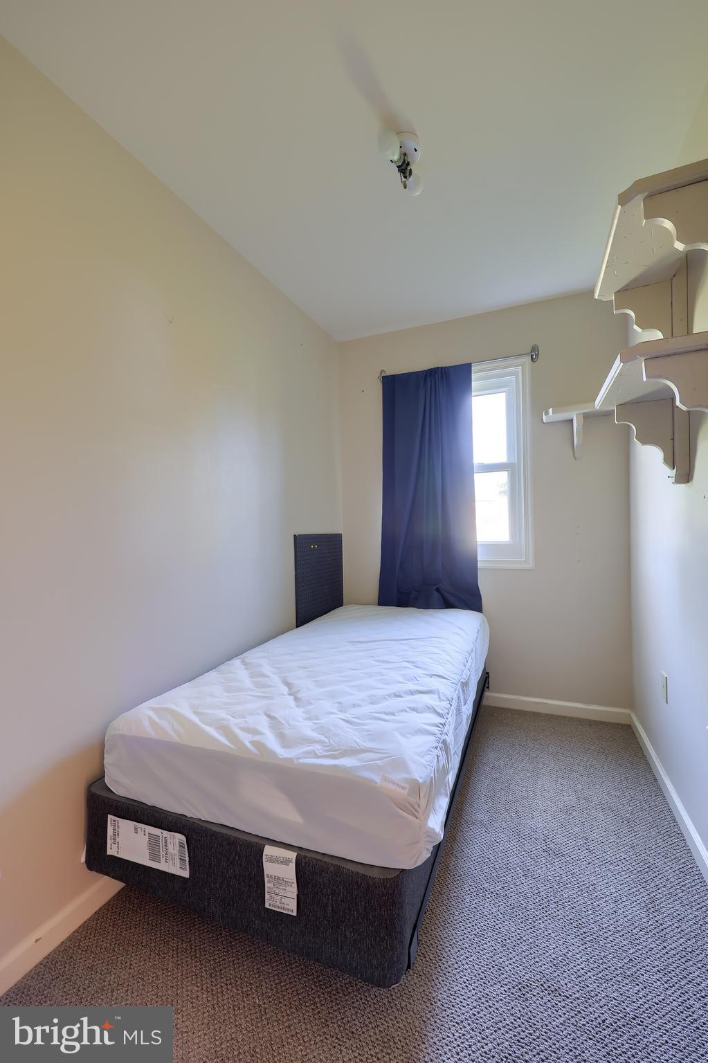 746 West 6th Street Lititz, PA 17543 - Photo 12 of 43 a bedroom with a bed and a window