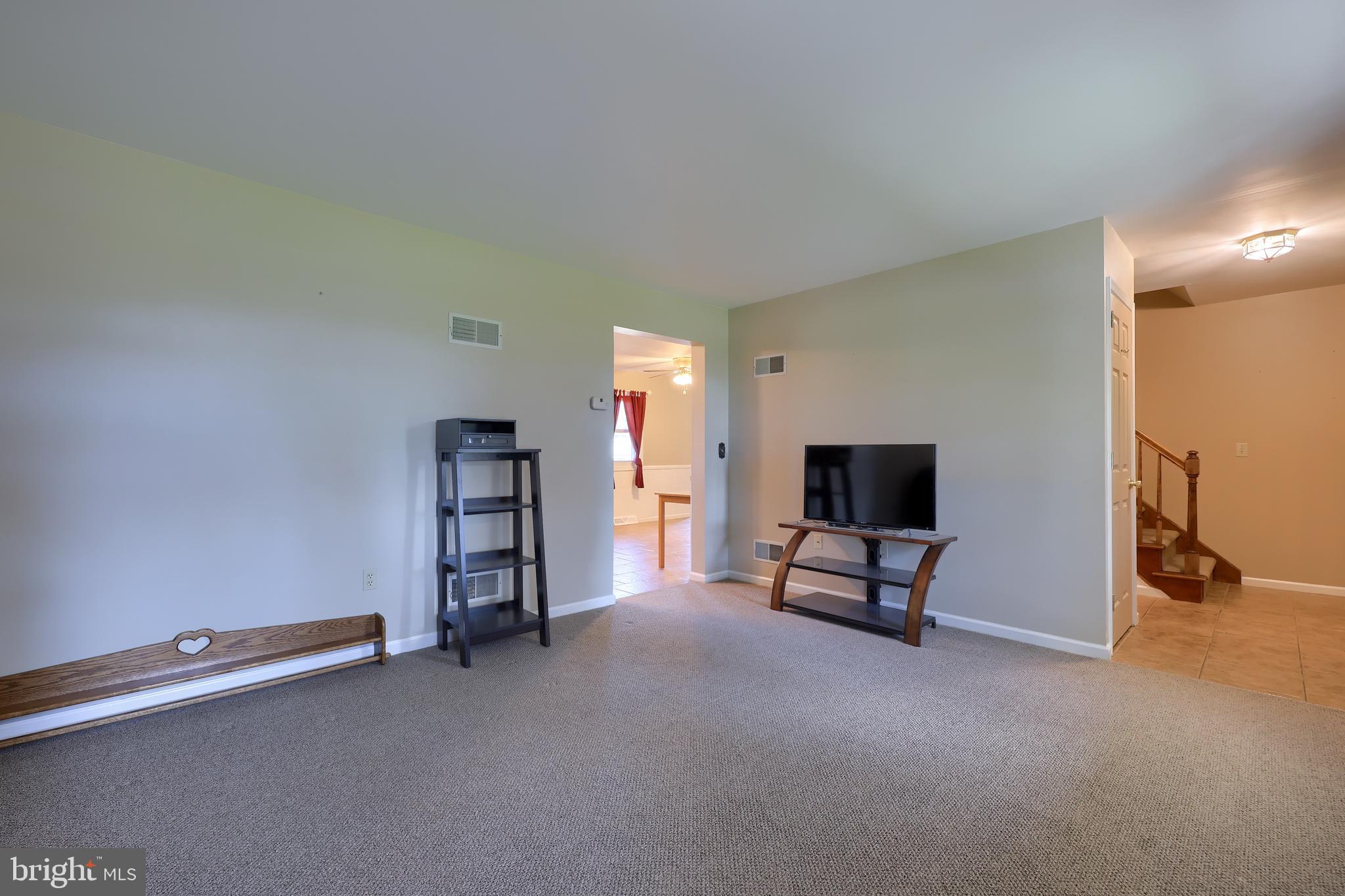 746 West 6th Street Lititz, PA 17543 - Photo 7 of 43 a living room with furniture and a flat screen tv