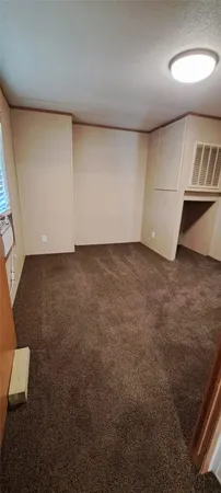 an empty room with a bench