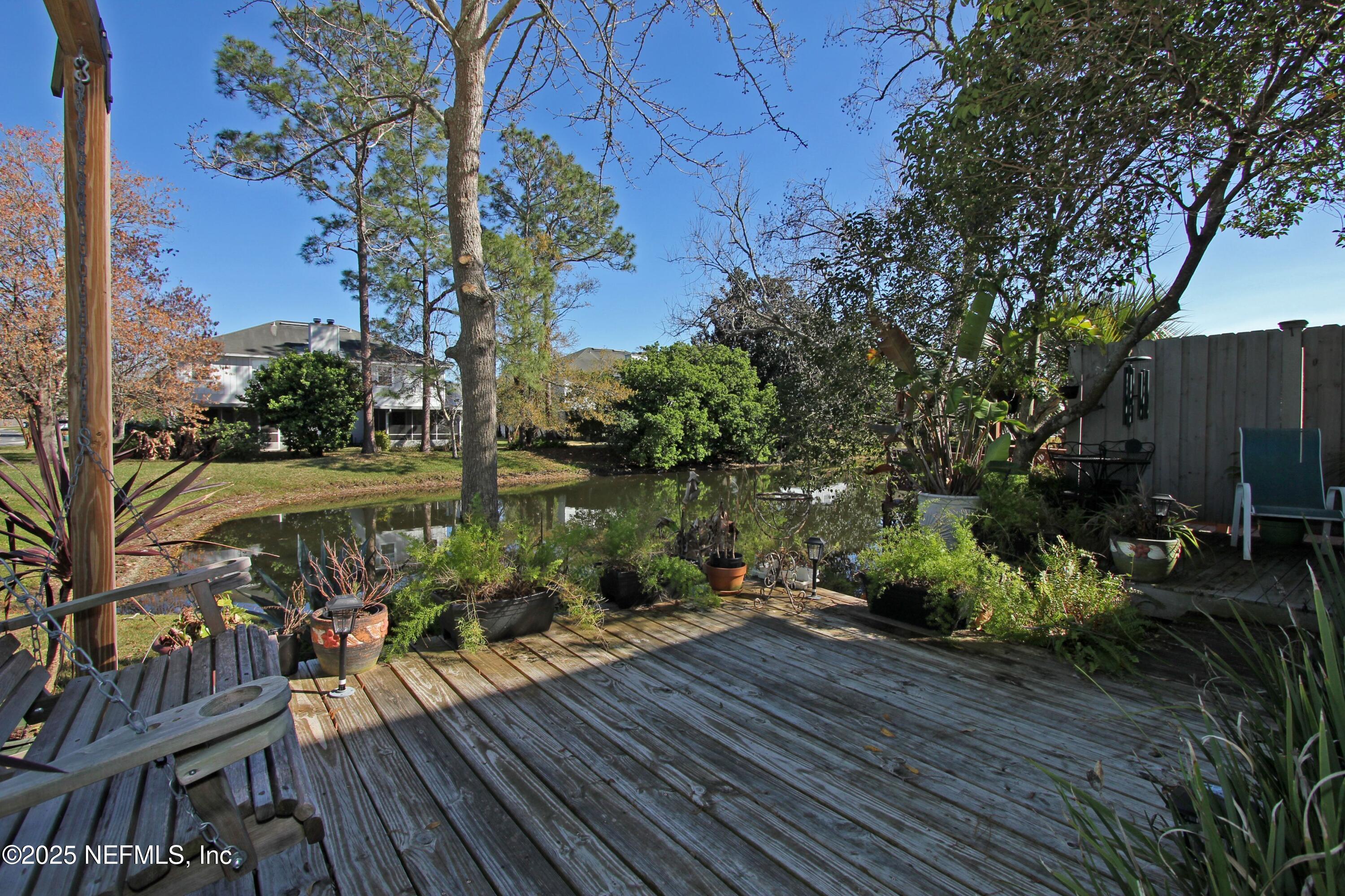 11023 Peppermill Lane Jacksonville, FL 32257 - Photo 32 of 35 swing & lake