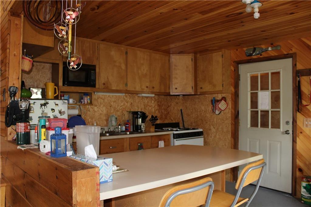 585 Old Spencer Road West Forks, ME 04985 - Photo 4 of 33 Large kitchen with gas stove and...