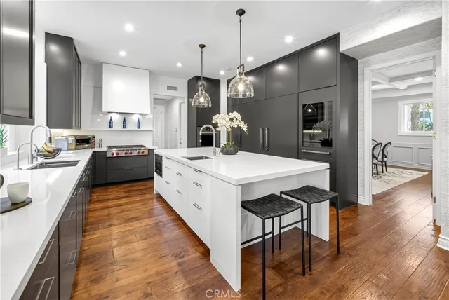 a large kitchen with a large window
