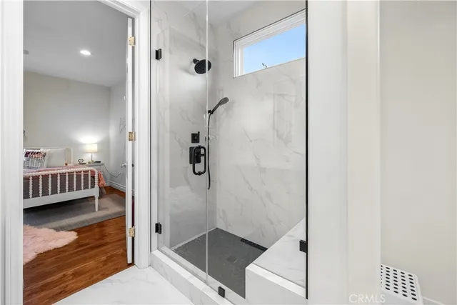 a bathroom with a double vanity sink and mirror