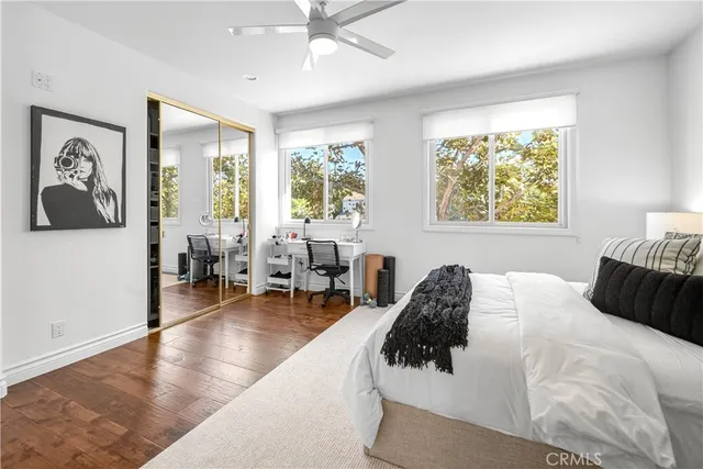 a bedroom with a bed and a cabinets