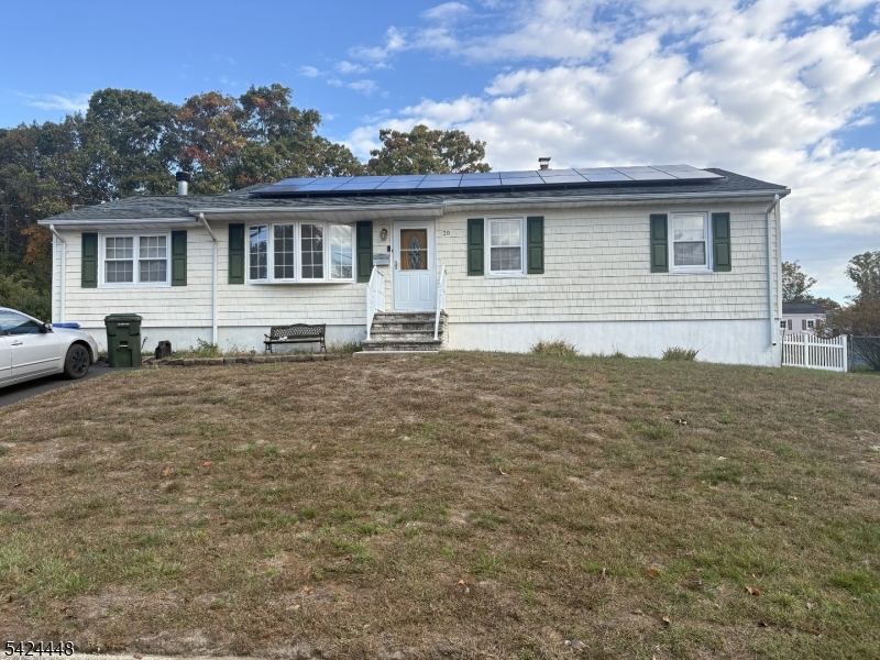20 Nottingham Drive Howell, NJ 07731 - Photo 1 of 21 a house view with a garden space