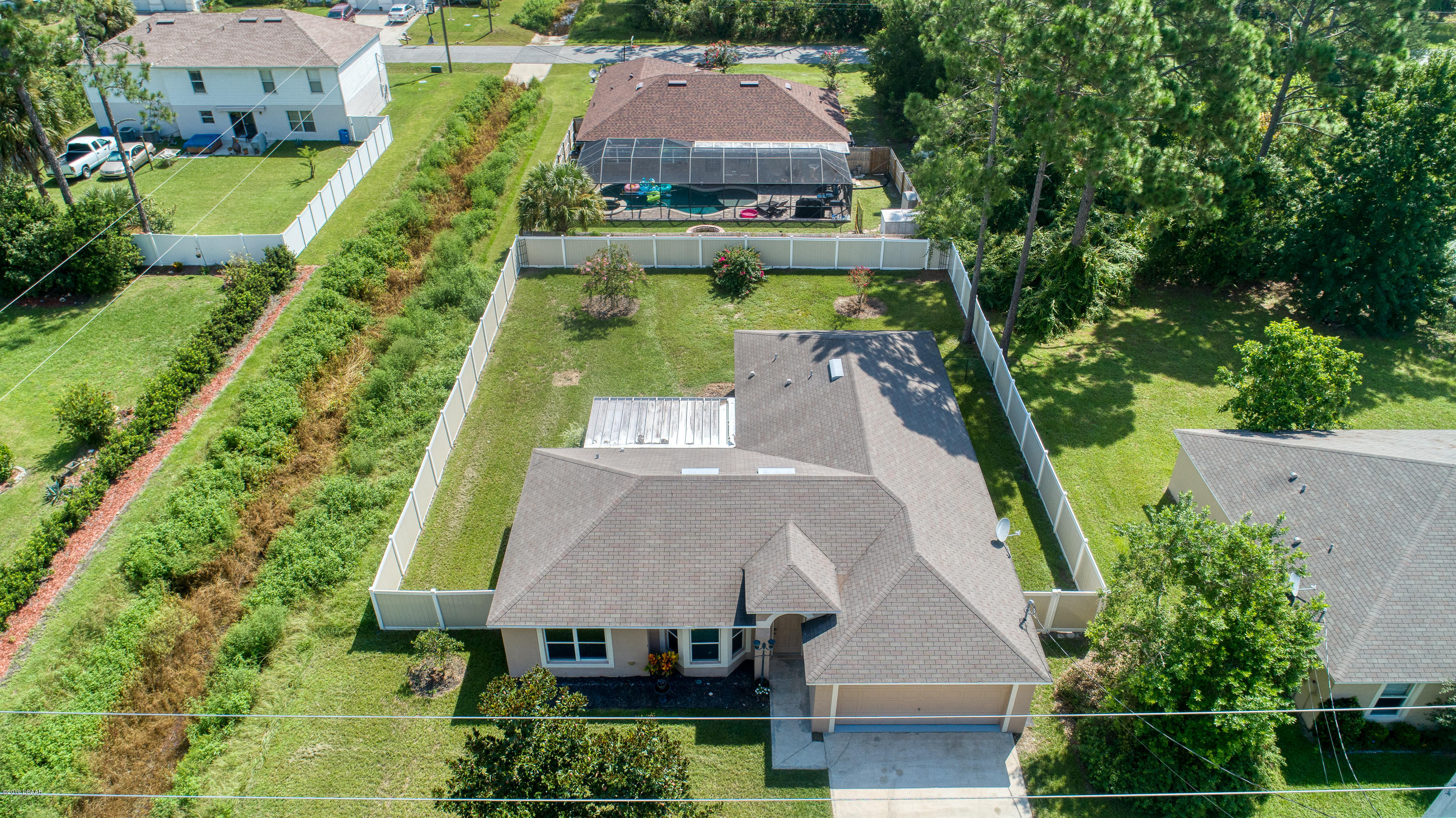 131 Rae Drive Palm Coast, FL 32164 - Photo 2 of 32 131RaeDrive_Drone-2