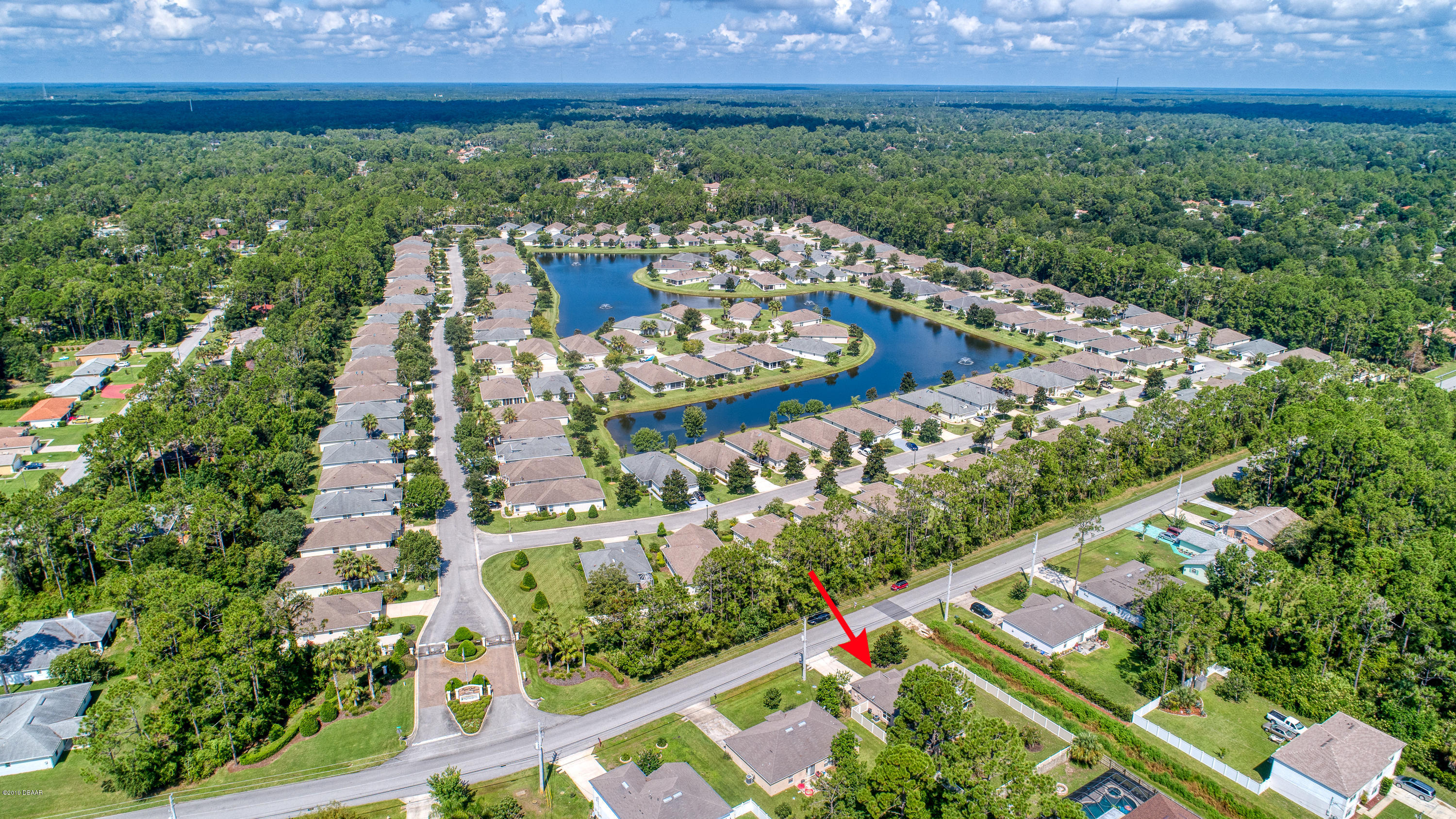 131 Rae Drive Palm Coast, FL 32164 - Photo 6 of 32 131RaeDrive_Drone-6_arrow