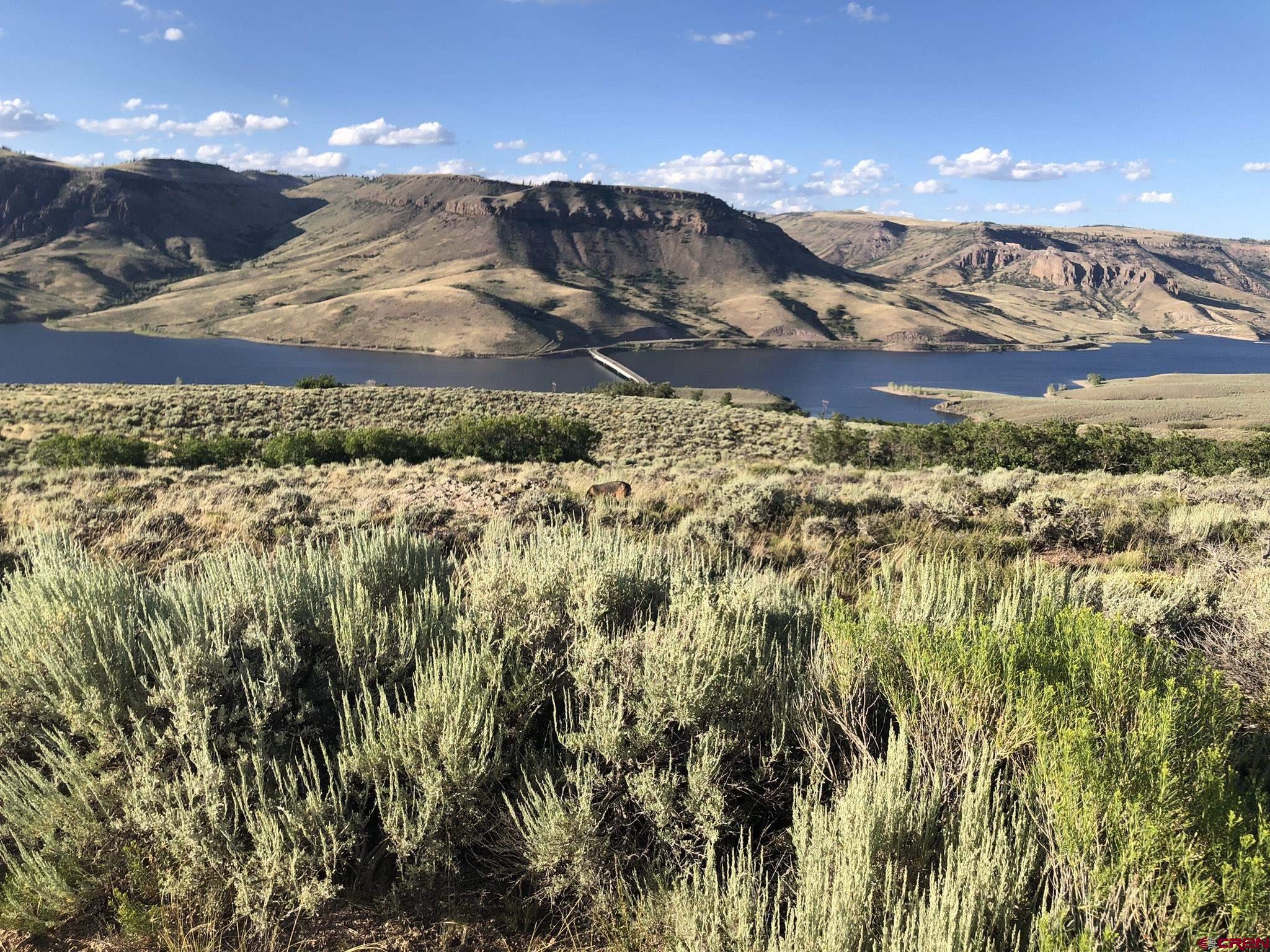 26 - Lake Gunnison, CO 81230 - Photo 1 of 17 a view of residential houses with outdoor space