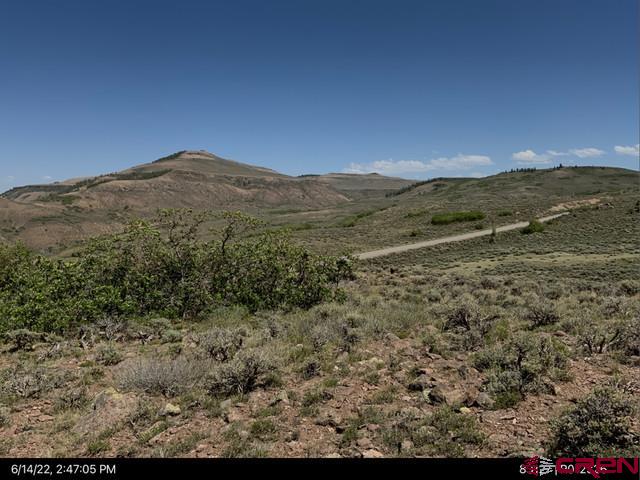 26 - Lake Gunnison, CO 81230 - Photo 12 of 17 a view of a large mountain with mountains in the background